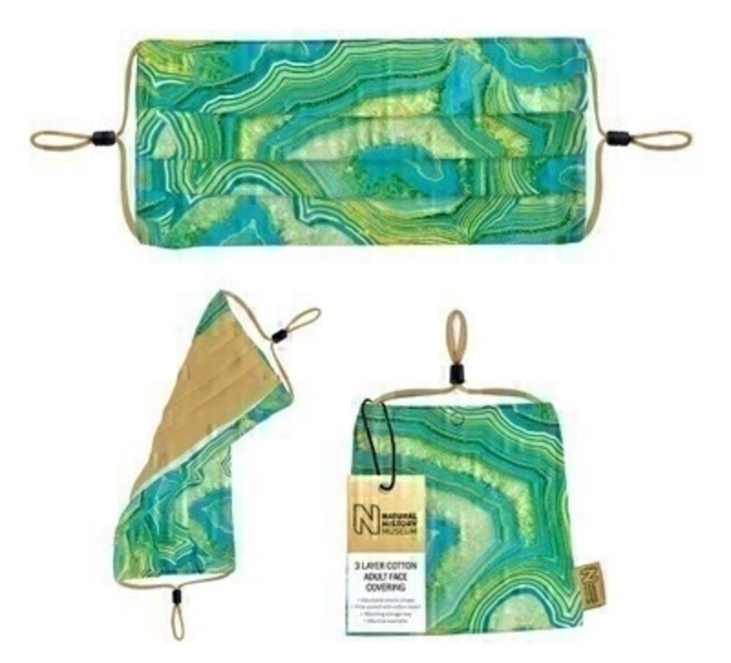 Green Fortification Agate Cotton Face Mask Green Fortification Agate Cotton Face Mask from Natural Hisory Museum. This non medical 3 layer cotton face covering has elastic straps with adjustment clips and has a filter pocket with removable cotton insert. The face covering is made out of 100% cotton pleated and cut for a better fit and digitally printed with a full-colour design on the front and contrast colour on reverse. The coverings have a pocket for filters and comes with a matching cotton bag for hygienic storage. Matching storage bag with popper closure to keep your mask safe and clean. Machine washable at 60C. Size in bag (mask folded in half) : 130 x 130 mm